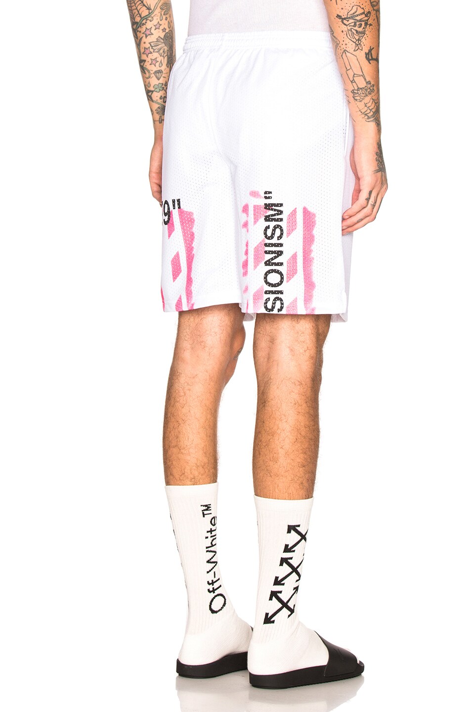 Image 1 of OFF-WHITE Diagonal Stencil Mesh Shorts in Off White & Fuchsia
