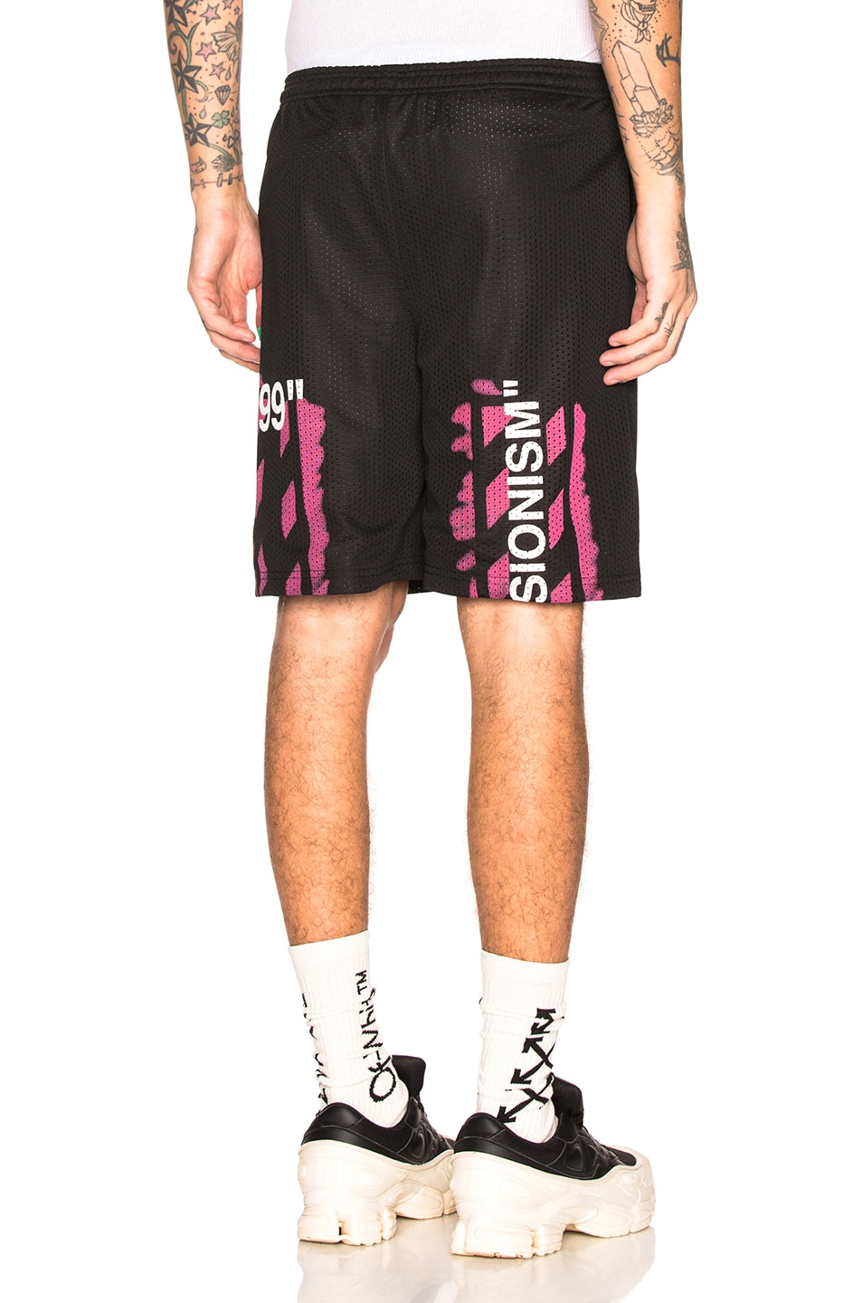 Image 1 of OFF-WHITE Diagonal Stencil Mesh Shorts in Black & Fuchsia