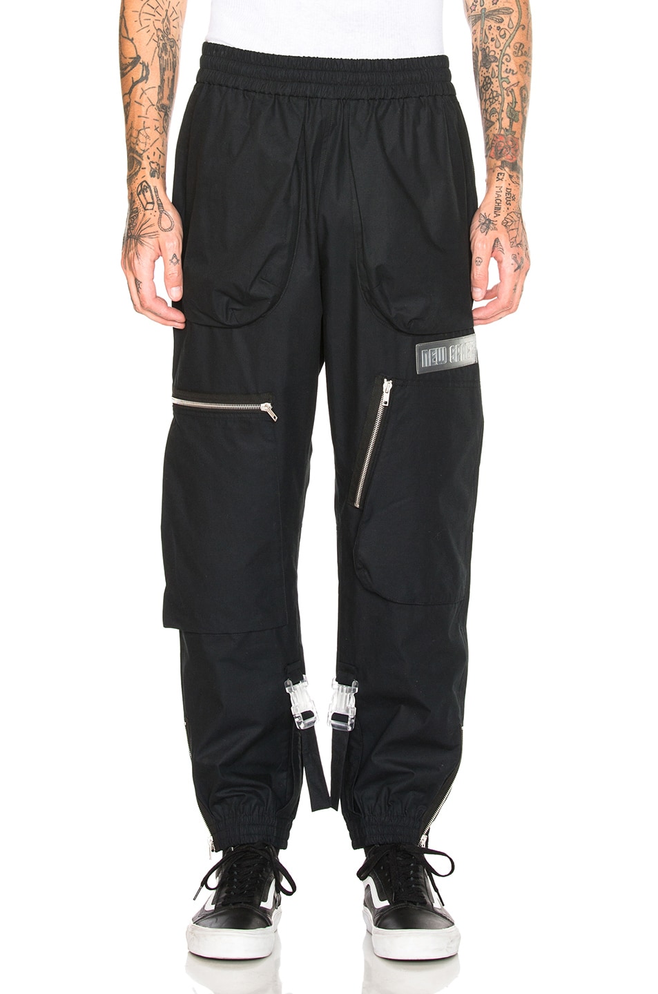 Image 1 of OFF-WHITE ART DAD Shuttle Track Pant in Black & Multicolor