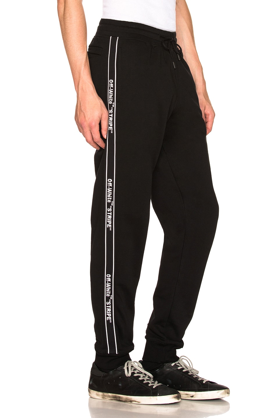 OFF-WHITE Stripe Sweatpants in Black | FWRD