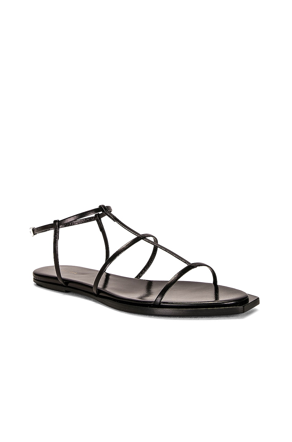 The Row T Bar Flat Sandals in Black | FWRD