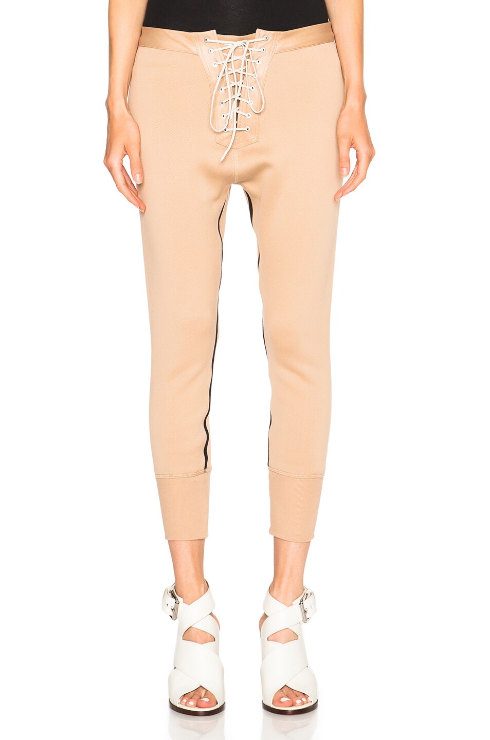 Image 1 of Unravel FWRD Exclusive Lace Up Leggings in Nude