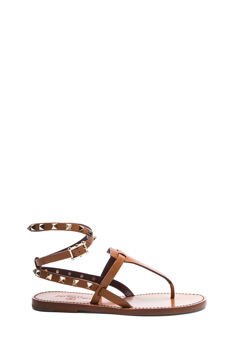 Valentino Rockstud Thong Grained Leather Sandals in Light Cuir | FWRD
