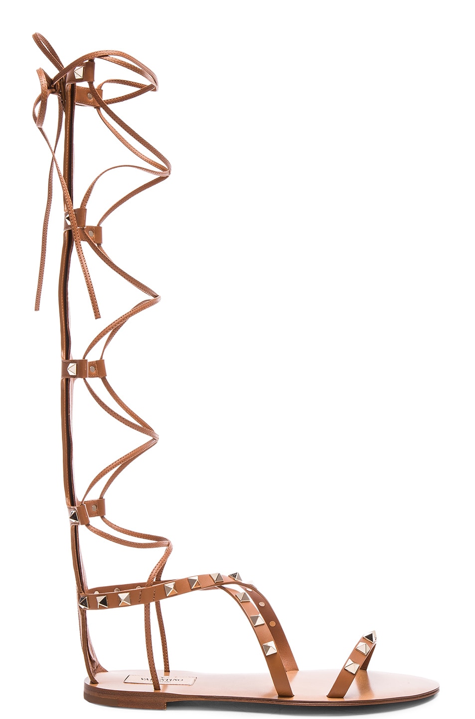 Image 1 of Valentino Garavani Rockstud Leather Tall Gladiator Sandals in Cognac
