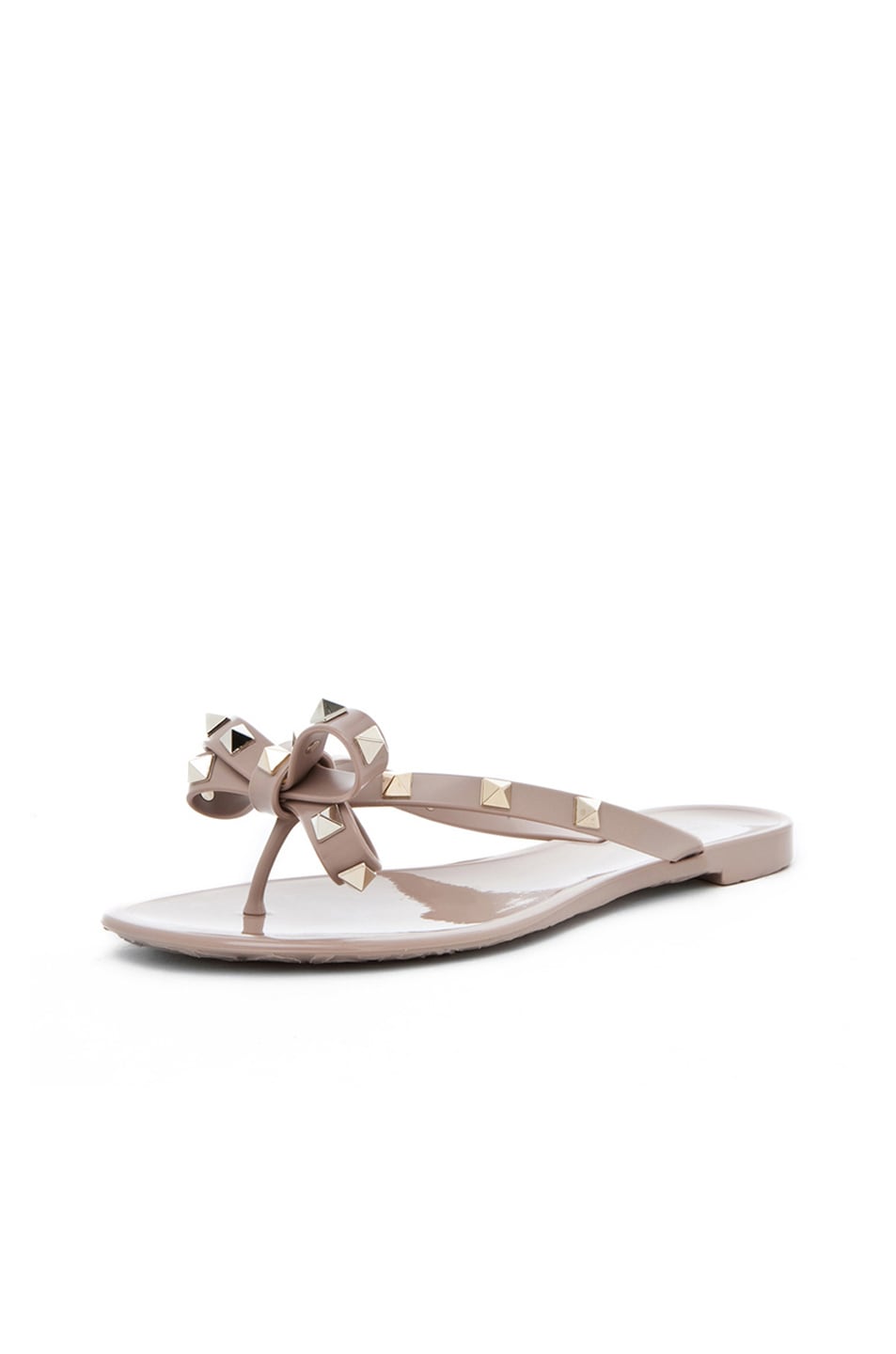 Shop Valentino Rockstud Bow Pvc Jellys In Nude & Platinum