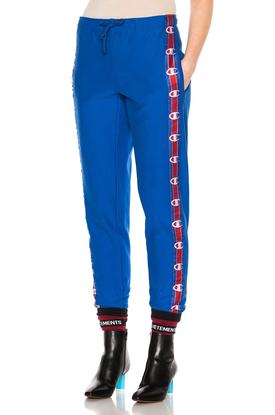 Image 1 of VETEMENTS x Champion Knee Shaped Tape Sweatpants in Blue