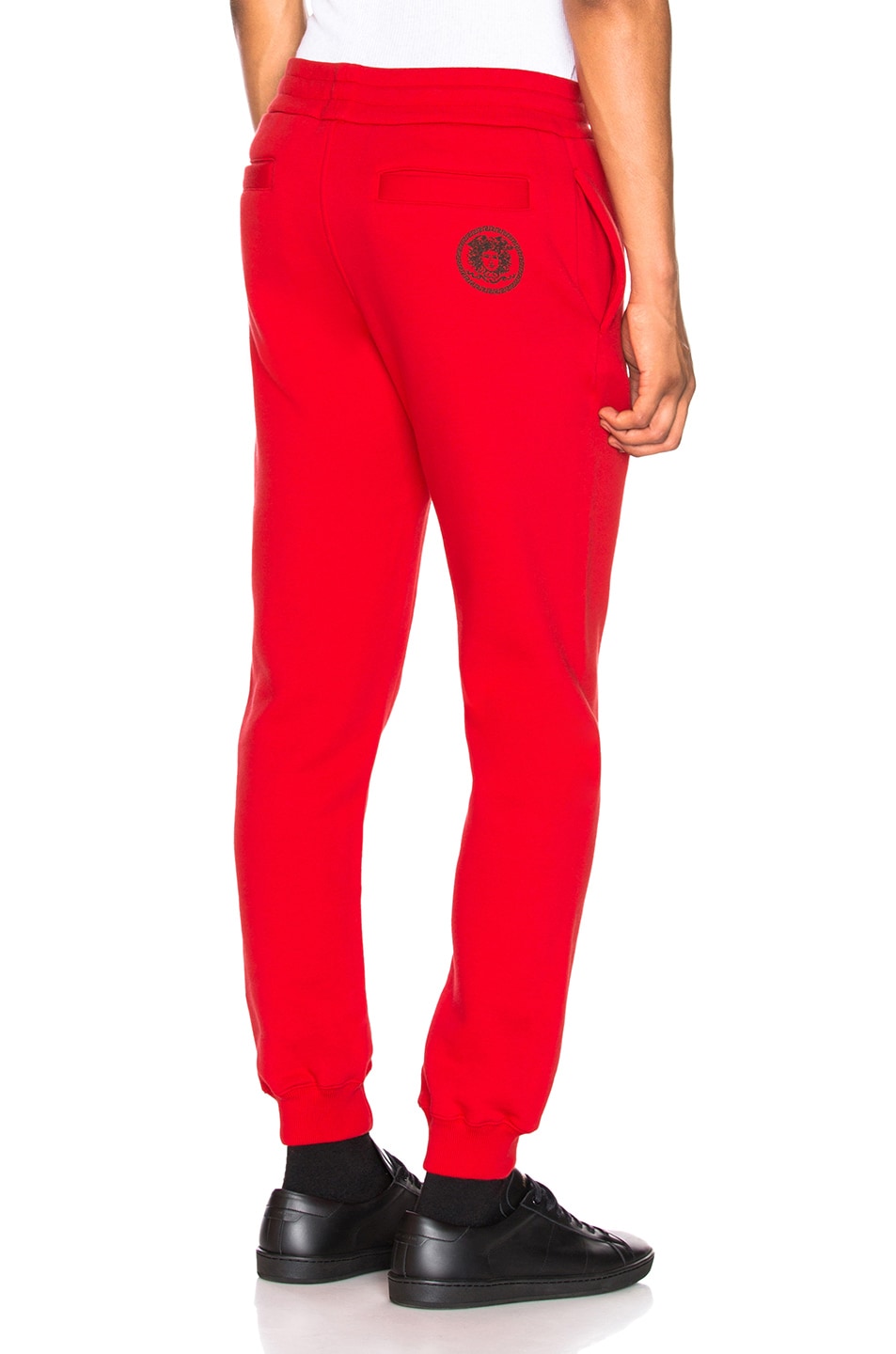 Image 1 of VERSACE Sweatpants in Red & Black