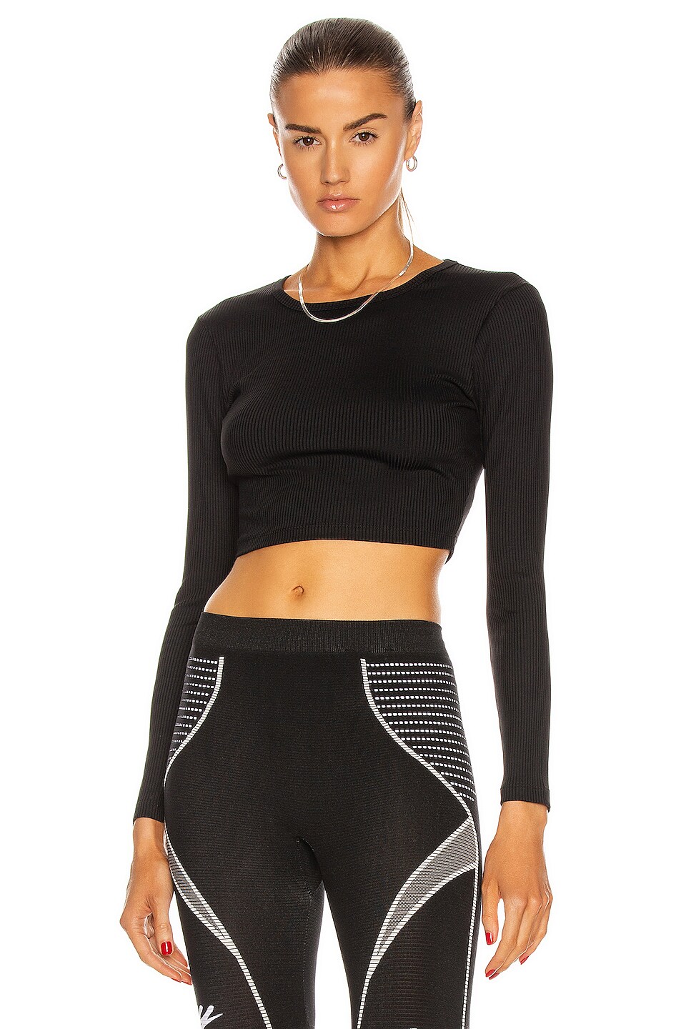 Image 1 of YEAR OF OURS Ribbed Crop Long Sleeve Top in Black