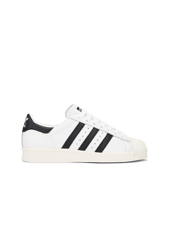 adidas Originals Superstar 82 Sneaker in White & Black | FWRD