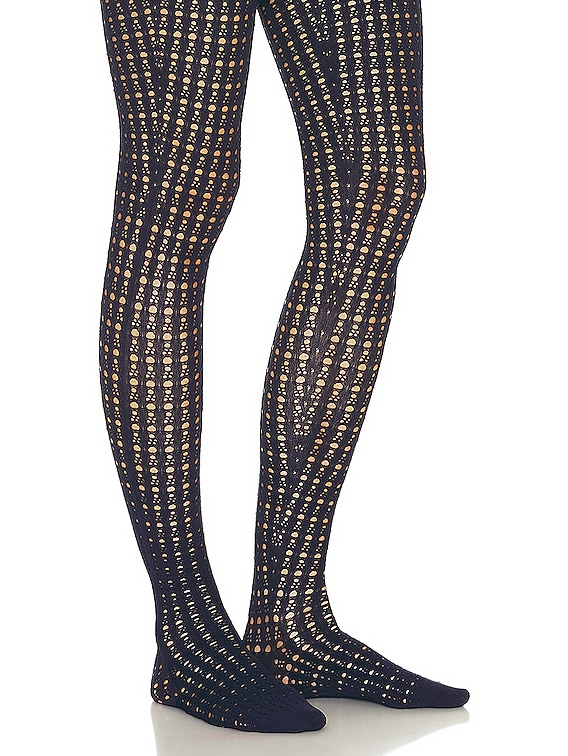 【Alaia】 Studded high-rise tights ALAÏA Vienne Jumpsuit in Encre | FWRD