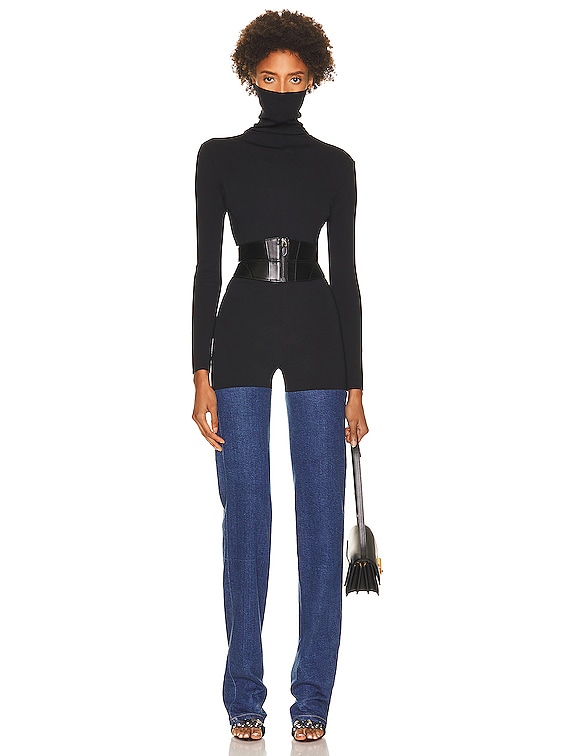 ALAÏA Denim Jumpsuit in Blue | FWRD