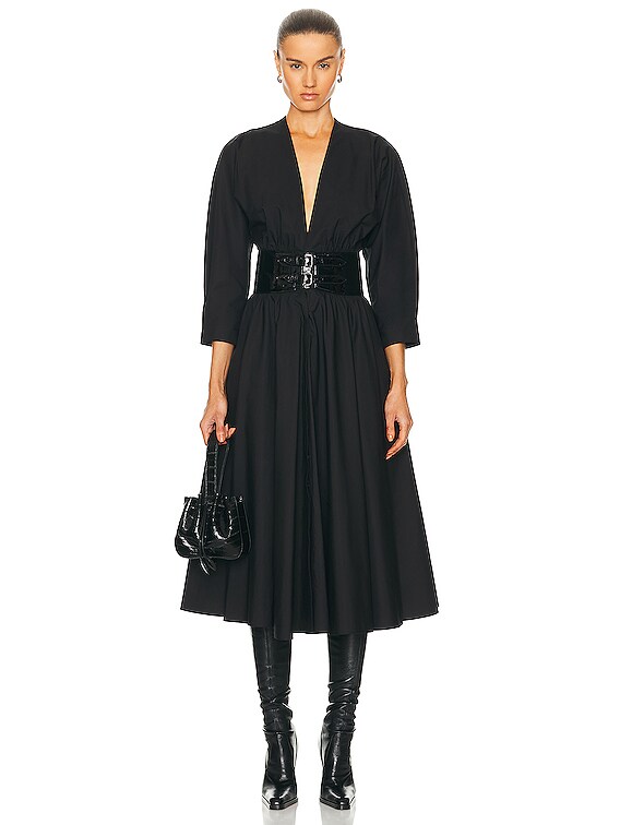 ALAÏA Long Sleeve Belt Dress in Noir | FWRD