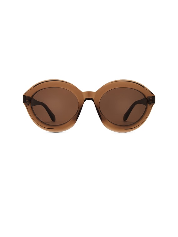 ALAÏA ALAЇA Round Sunglasses in Brown | FWRD