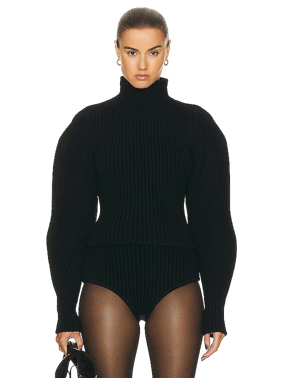 ALAÏA High Neck Sweater in Noir Alaia | FWRD