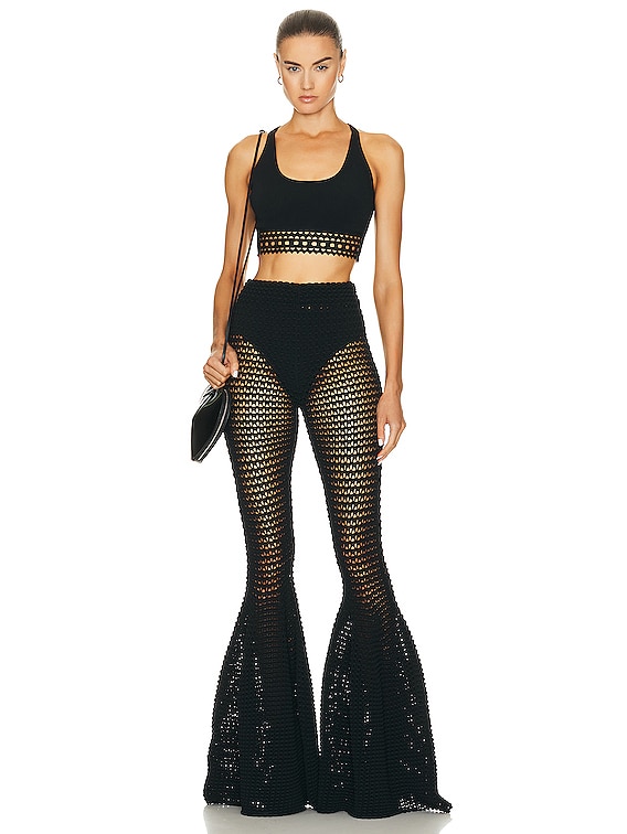 ALAÏA Waffle Flare Pant in Noir Alaia | FWRD