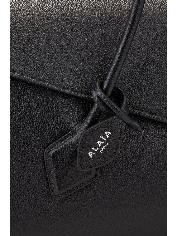 ALAÏA Le Teckel Flap Bag in Noir | FWRD