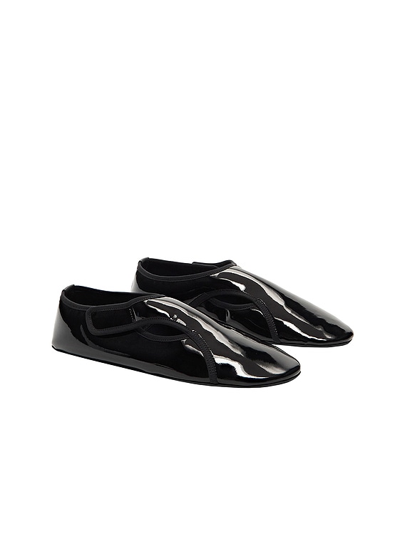 ALAÏA ALAΪA Patent Slippers in Noir | FWRD