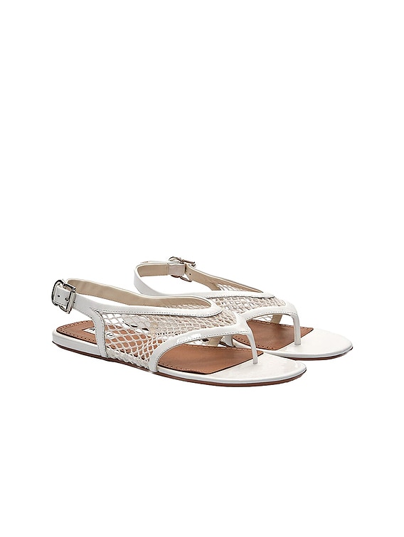 ALAÏA Fishnet Flat Sandal in Blanc Optique | FWRD