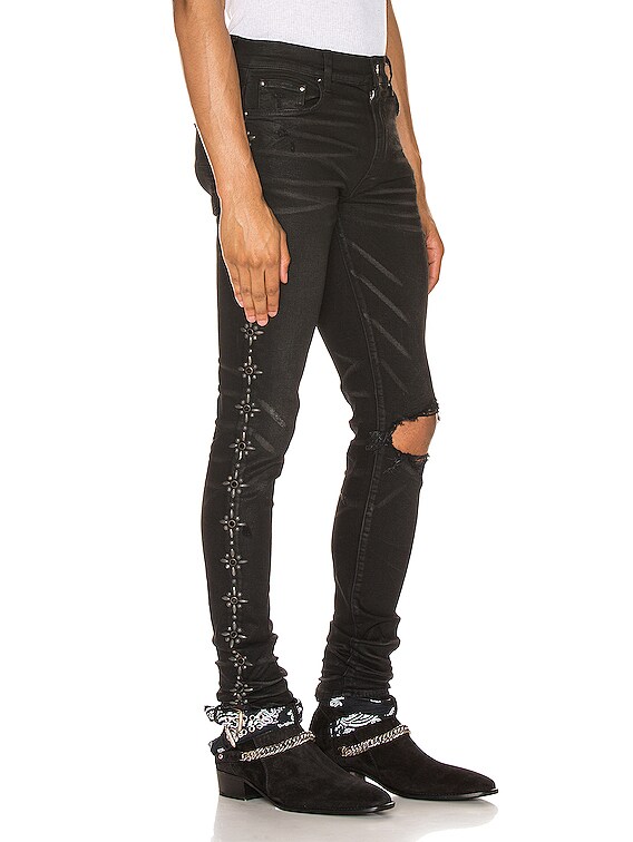 amiri broken jeans