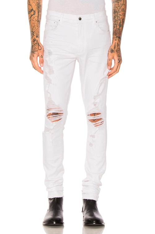 white amiri jeans