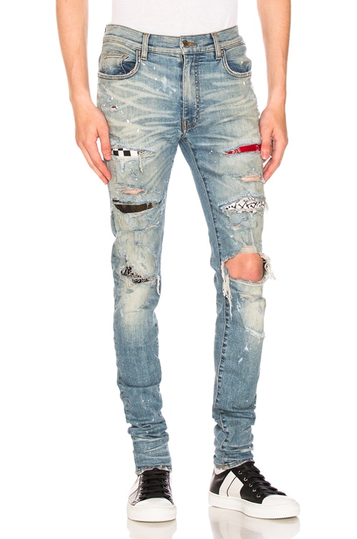 amiri jeans with paint