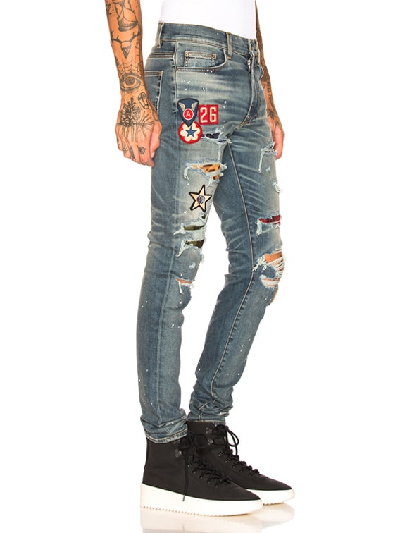 amiri black art patch painted jeans
