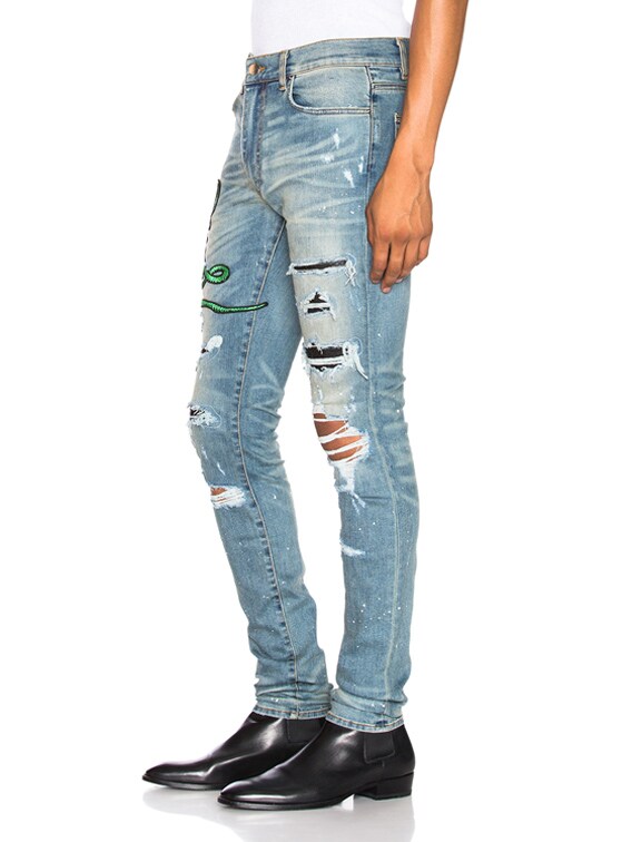 amiri art patch snake jeans