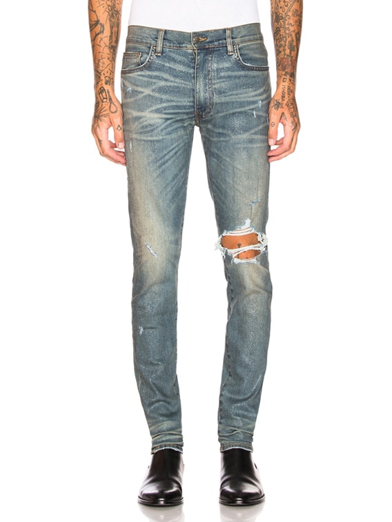 amiri broken jeans