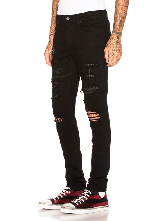 amiri art patch snake jeans