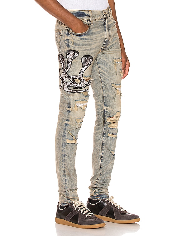 snake amiri jeans