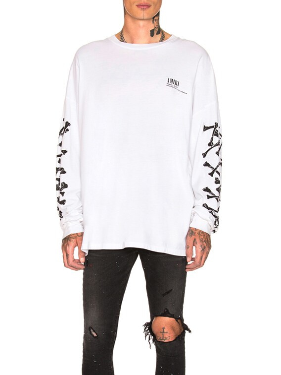【AMIRI】 要在庫確認 BONES ロングスリーブ Tシャツ Amiri Bones Long Sleeve Tee in White & Black | FWRD