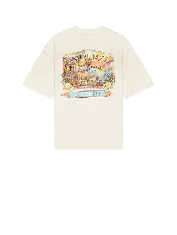 AMIRI アミリ ロゴ Tシャツ JAZZ HIDEAWAY ベージュ 関税込 Amiri Jazz Hideaway Tee in Ivory | FWRD