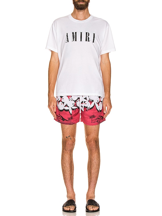 Amiri Playboy Hawaiian Swim Trunks in Red | FWRD