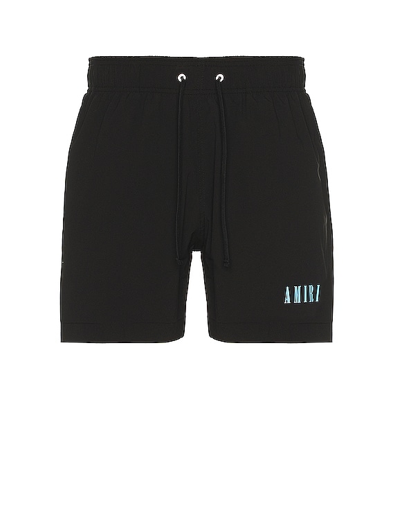 Amiri Core Logo Swim Trunks in Black | FWRD