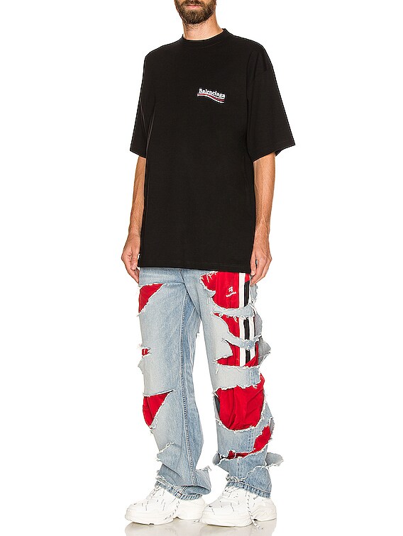 Balenciaga Slashed Loose Fit Jean in Clear Light Blue | FWRD