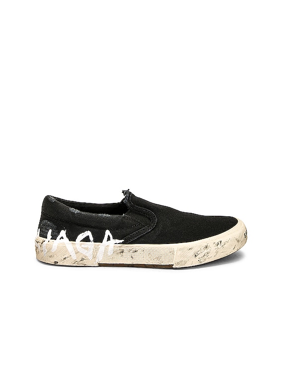 Balenciaga Paris Slip On Sneaker in Black & White | FWRD