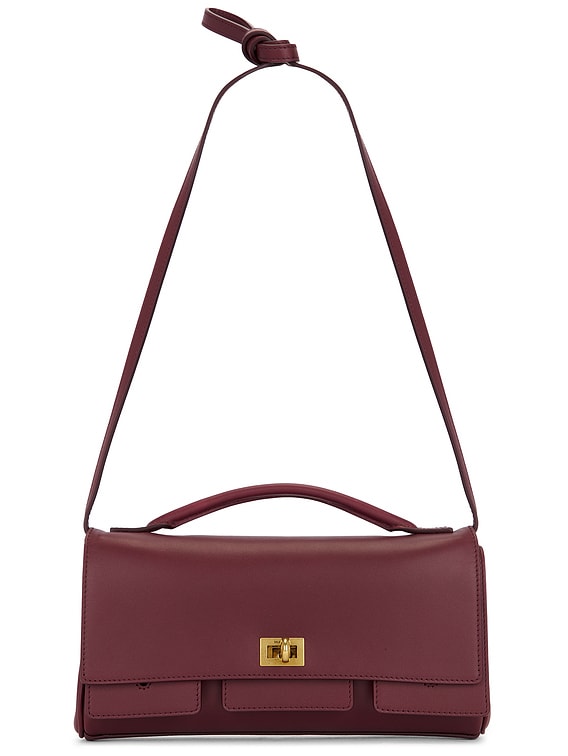 Balenciaga Bel Air Strap Clutch Bag in Dark Burgundy | FWRD