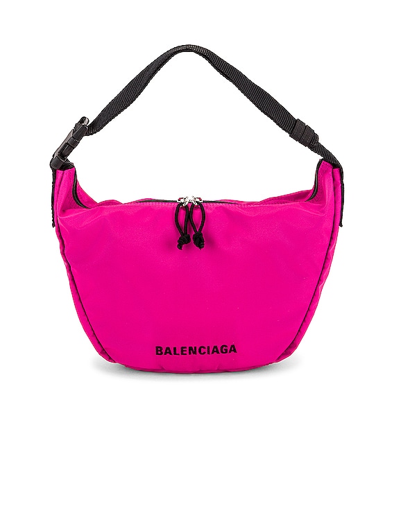 Balenciaga Wheel Sling Bag in Fluo Pink & Black | FWRD