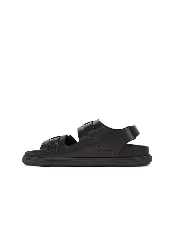 BIRKENSTOCK Cannes High Shine Exquisite Sandal in Black | FWRD