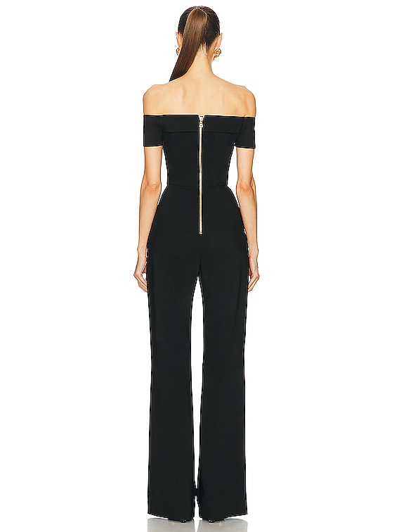 オールインワン・サロペット BALMAIN OFF-SHOULDERS FLARE CREPE JUMPSUIT BALMAIN Off Shoulders Flare Crepe Jumpsuit in Noir | FWRD