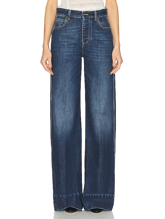 デニム・ジーパン BOTTEGA VENETA Indigo wide leg jeans turn ups Indigo Bottega Veneta Indigo Wide Leg Jeans in Mid Blue | FWRD