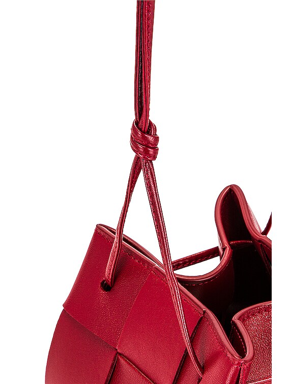 Bottega Veneta Small Cassette Bucket Bag in Dark Red & Gold | FWRD