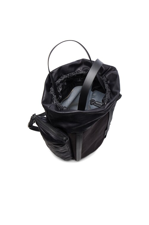 Cote & Ciel Saar Medium Waxed Canvas Bag in Jasper Black | FWRD display picture 3
