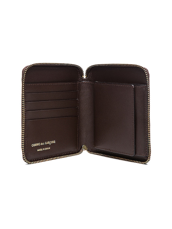 COMME des GARCONS Star Embossed Zip Fold Wallet in Brown | FWRD