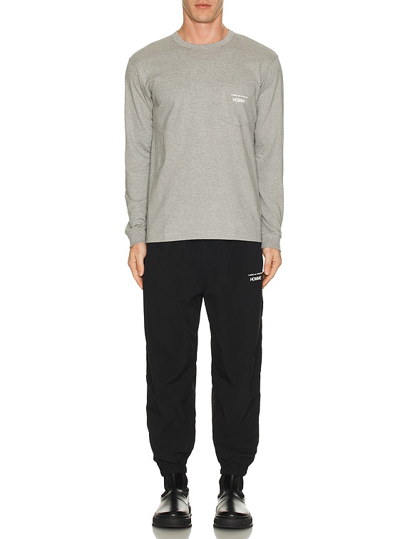 COMME des GARCONS HOMME Nylon Typewriter Pants in Black | FWRD