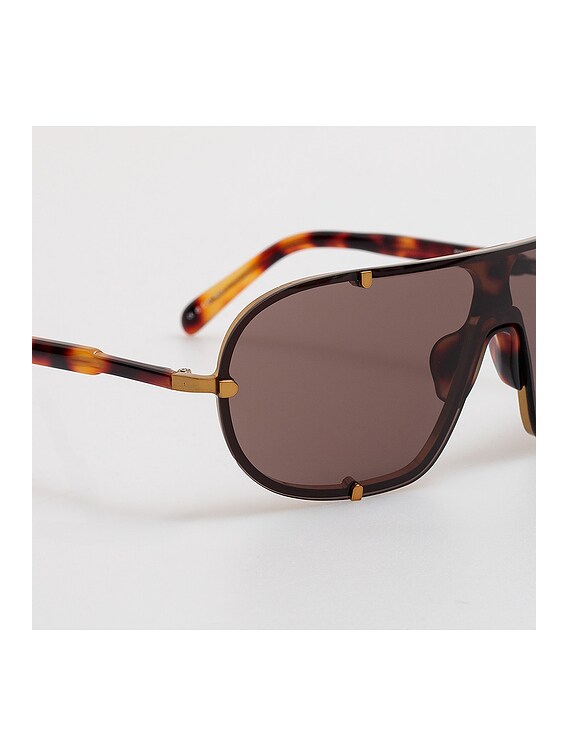 Dries Van Noten Shield Sunglasses in Old Gold, T-Shell, & Brown | FWRD