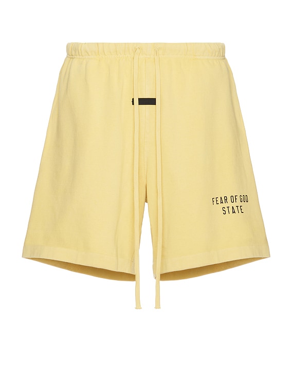 Fear of God ESSENTIALS Heavy Jersey Soccer Short in Amber | FWRD