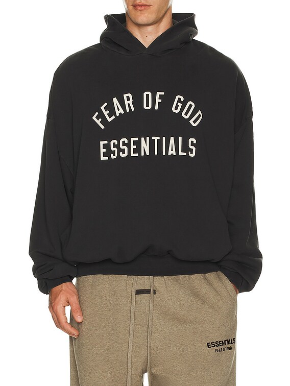 Fear of God ESSENTIALS 90'S Fit Hoodie in Vintage Black | FWRD