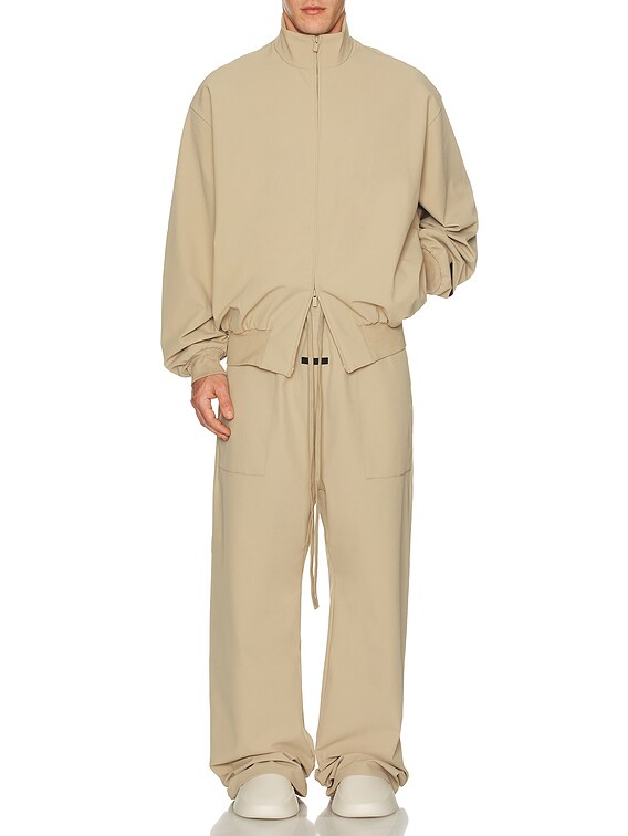 Fear of God ESSENTIALS Bonded Nylon Utility Pant in Desert Sand | FWRD