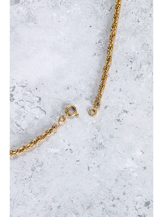 FWRD Renew Chanel Cambon Plate Necklace in Gold | FWRD